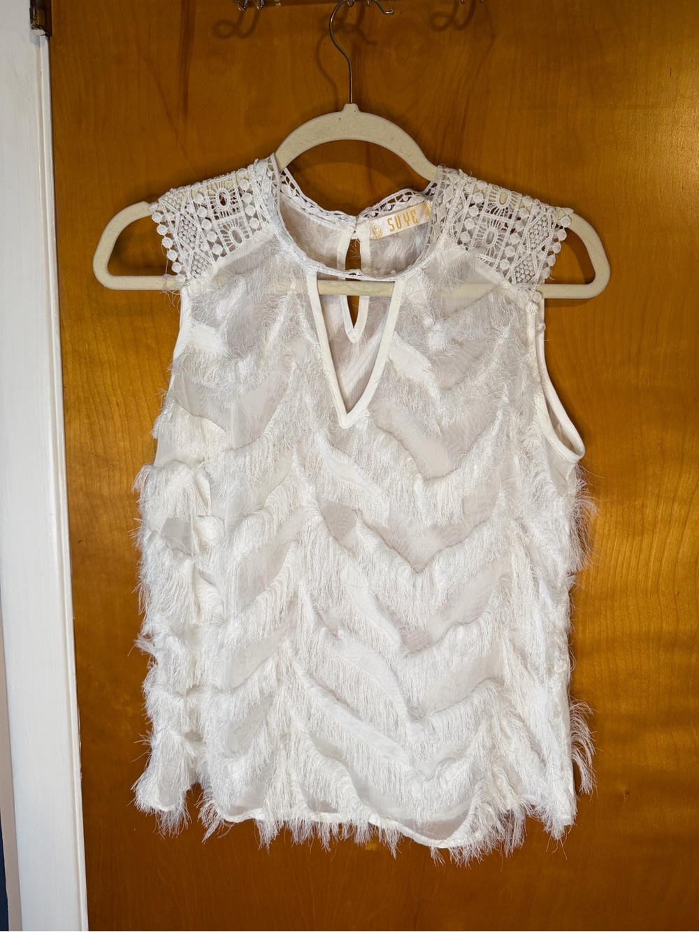Sleeveless White Fringe Chevron Blouse with Crochet Yoke